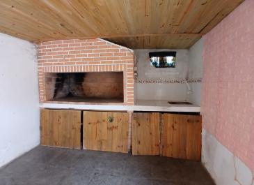 barbacoa con parrillero
